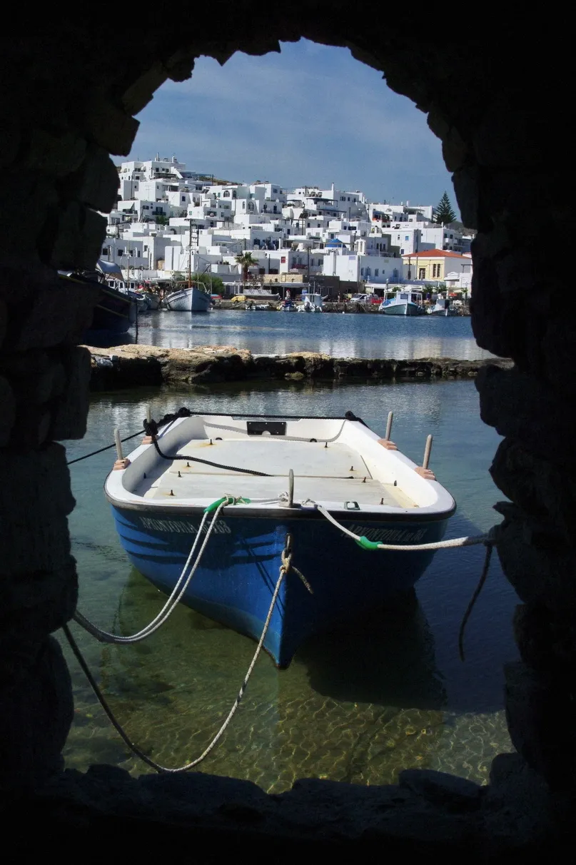 Fishing boat below the Venetian sea wall of Naoussa in Paros