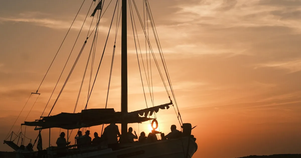 Golden sunset over the Aegean from the deck of a boat on a two-hour Paros sunset cruise near Antiparos